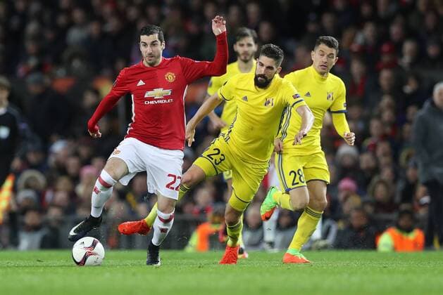 Football - 2016 2017 Europa Cup - Round 16, 2nd leg - Manchester United ManU vs FC Rostov Henrik Mkhitaryan of Manchester United and Miha Mevlja of FC Rostov during the match at Old Trafford. 