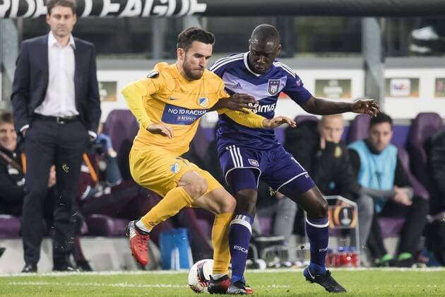 (L-R) Yannis Gianniotas of Apoel FC , Dennis Appiah of RSC Anderlechtduring the UEFA Europa League round of 16 match between RSC Anderlecht and APOEL on March 16, 2017 at Constant Vanden Stock Stadium in Brussels, Belgium. RSC Anderlecht v APOEL UEFA Europa League 2016 2017 xVIxGerritxvanxKeulenxIVx 7354979