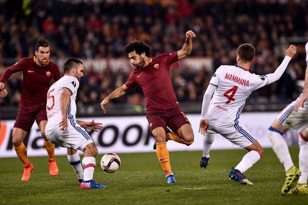 March 16, 2017 - Rome, Italy - Mohamed Salah of AS Roma is challenged by Emanuel Mammana of Olympique Lyonnais during the UEFA Europa League match between Roma and Olympique Lyonnais at Stadio Olimpico, Rome, Italy on 16 March 2017 Roma v Olympique Lyonnais UEFA Europa League  - ZUMAn230 20170316_zaa_n230_142 Copyright: xGiuseppexMaffiax