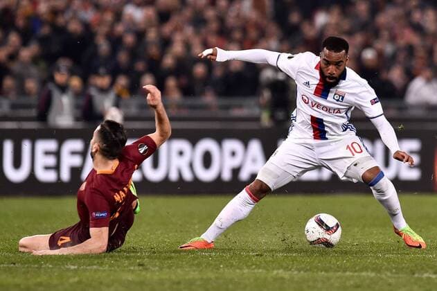 March 16, 2017 - Rome, Italy - Alexandre Lacazette of Olympique Lyonnais is challenged by Konstantinos Manolas of AS Roma during the UEFA Europa League match between Roma and Olympique Lyonnais at Stadio Olimpico, Rome, Italy on 16 March 2017 Roma v Olympique Lyonnais UEFA Europa League  - ZUMAn230 20170316_zaa_n230_158 Copyright: xGiuseppexMaffiax