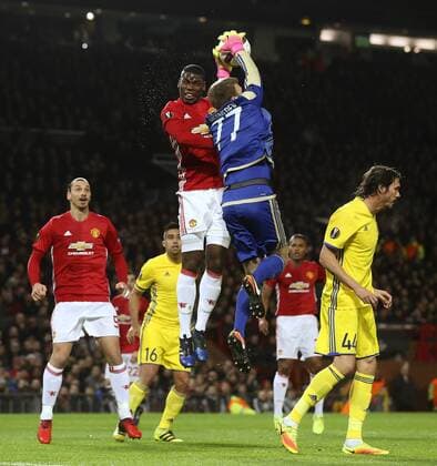 Paul Pogba of Manchester United ManU clashes with Nikita Medvedev of FC Rostov during the UEFA Europa League Round of 16 2nd leg match at Old Trafford Stadium, Manchester. Picture date: March 16th, 2017. Pic credit should read: Matt McNulty Sportimage EDITORIAL USE ONLY. No use with unauthorised audio, video, data, fixture lists, club league logos or live services. Online in-match use limited to 120 images, no video emulation. No use in betting, games or single club league player publications.