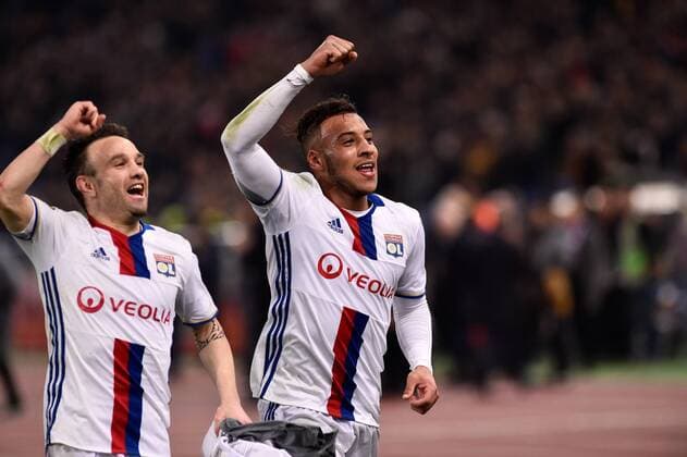 Mathieu Valbuena of Olympique Lyonnais and Corentin Tolisso of Olympique Lyonnais celebrate the victory at the end of the UEFA Europa League match between Roma and Olympique Lyonnais at Stadio Olimpico, Rome, Italy on 16 March 2017. Copyright: xGiuseppexMaffiax 14640062