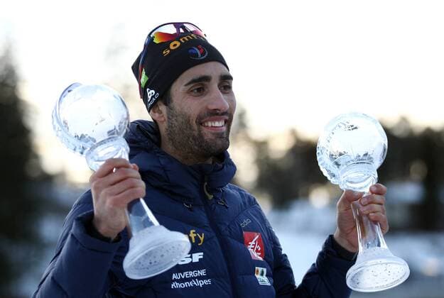 HOLMENKOLLEN, NORWAY - MARCH 17, 2017: Martin Fourcade of France is awarded a small Crystal Globe trophy in the 2016 2017 Season total for the men s 10km sprint event and a small Crystal Globe trophy in the 2016 2017 Season total for individual races, at 2016 2017 IBU World Cup Biathlon 9 in Holmenkollen, Oslo. Andrei Anosov Russian Biathlon Union TASS  TS044A1B
