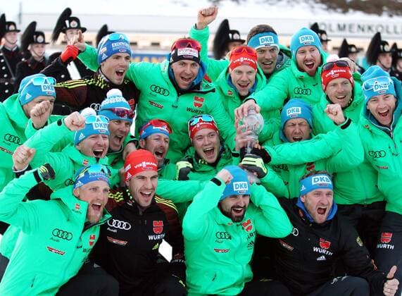 HOLMENKOLLEN, NORWAY - MARCH 17, 2017: German biathletes pose for a group photograph with their trophies after the men s 10km sprint event at 2016 2017 IBU World Cup Biathlon 9 in Holmenkollen, Oslo. Andrei Anosov Russian Biathlon Union TASS  TS044B3B