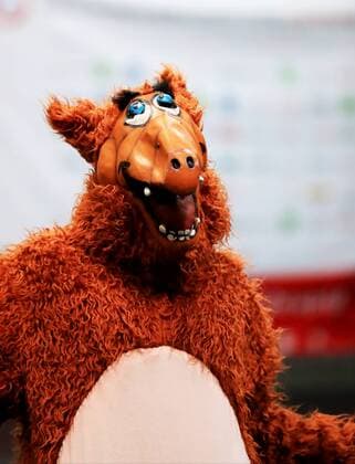 SPECIAL OLYMPICS - SOWWG 2017 GRAZ,AUSTRIA,19.MAR.17 - SPECIAL OLYMPICS, FLOORBALL - World Winter games Winterspiele Spiele Summer games round robin games. Image shows a fan from Austria Europe with an Alf costume. GEPAxpictures xMarioxBuehner