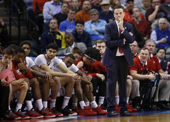 March 19, 2017 - Indianapolis, IN, USA - Louisville Cardinals head coach Rick Pitino and his team watch the final seconds against Michigan on Sunday, March 19, 2017, in Indianapolis, Ind. Second seed Louisville lost to seventh seed Michigan 73-69. Louisville vs. Michigan men s basketball - ZUMAm67_ 20170319_zaf_m67_024 Copyright: xSamxRichex