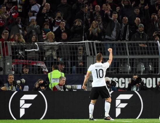 22.03.2017, xjhx, Fussball Freundschaftsspiel, Deutschland - England, emspor, v.l. Lukas Podolski (Deutsche Fussball Nationalmannschaft DFB) celebrate the goal, Torjubel zum 1:0 Dortmund