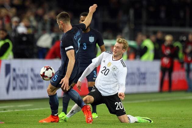 22.03.2017, Signal Iduna Park, Dortmund, GER, Testspiel, Deutschland vs England, im Bild Gary Cahill of England and Julian Brandt of Germany in action Gary Cahill of England and Julian Brandt of Germany in action during the friendly soccer match between Germany and England at the Signal Iduna Park in Dortmund, Germany on 2017 03 22. Dortmund  EP_fil  