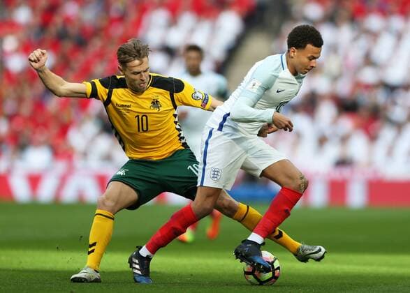 March 26th 2017, Wembley Stadium, London, England; World Cup 2018 Qualification football, England versus Lithuania; Dele Alli of England challenged by Arturas Zulpa of Lithuania xJohnxPatrickxFletcherx  ActionPlus11860824
