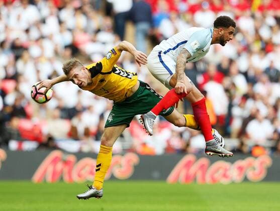 Lorenzo Cittadini of Lithuania challenges Kyle Walker of England during the Group F World Cup Qualifier at Wembley Stadium, London. Picture date: March 26th, 2017. Pic credit should read: Matt McNulty Sportimage EDITORIAL USE ONLY. No use with unauthorised audio, video, data, fixture lists, club league logos or live services. Online in-match use limited to 120 images, no video emulation. No use in betting, games or single club league player publications.