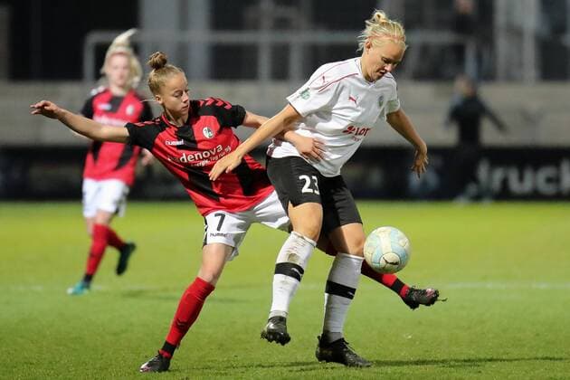v.li.: Giulia Gwinn (Freiburg, 7), Lise Overgaard Munk (Frankfurt, 23), Zweikampf, Duell, duel, tackle, tackling, Dynamik, Action, Aktion, Fussball, Allianz Frauen-Bundesliga, 1. FFC Frankfurt - SC Freiburg, xozx