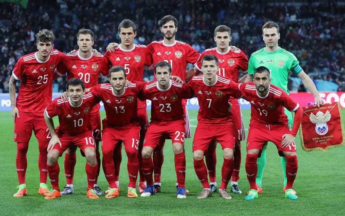 SOCHI, RUSSIA - MARCH 28, 2017: Russia s Alan Dzagoev, Fyodor Kudryashov, Dmitry Kombarov, Dmitry Poloz, Alexander Samedov (L-R front), Roman Neustadter, Maxim Kanunnikov, Viktor Vasin, Alexander Yerokhin, Roman Zobnin, and goalkeeper Igor Akinfeev (L-R back) pose for a group photo ahead of a friendly football match against Belgium at Fisht Stadium. Artyom Korotayev TASS  TS045D62