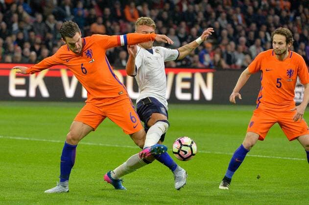 March 28, 2017 - Amsterdam, Netherlands - (L-R) Kevin Strootman from the Netherlands Ciro Immobile from Italy and Daley Blind from the Netherlands during the friendly match between Netherlands and Italy on March 28, 2017 at the Amsterdam ArenA in Amsterdam, Netherlands. Netherlands v Italy - International Friendly Länderspiel  - ZUMAn230 20170328_zaa_n230_289 Copyright: xAndyxAstfalckx