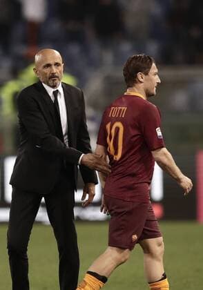 Italy: Soccer Serie A - Roma beats Empoli 2-0 Roma coach Luciano Spalletti, left, greets his player Francesco Totti at the end of the Serie A soccer match between Roma and Empoli at the Olympic stadium. Roma won 2-0.  IsabellaxBonottox xPacificxPress