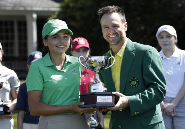 Past Masters champion Trevor Immelman stands with Alexa Pano who wins the overall in the Drive, Chip & Putt Championship for Girls age 12-13 at the 2017 Masters Tournament at Augusta National Golf Club in Augusta, Georgia on April 2, 2017.  AUG20170402115 JOHNxANGELILLO
