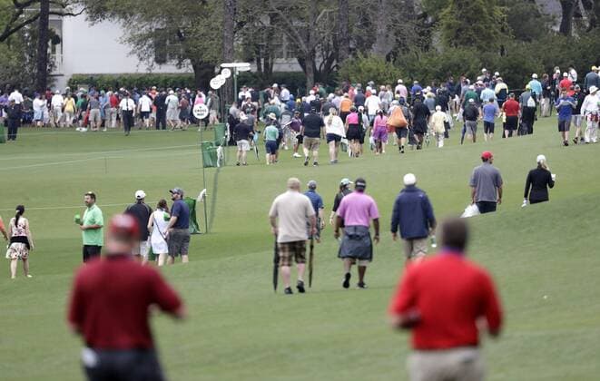 Patrons exit the grounds after play is suspended for the day due to an incoming storm on Monday s practice rounds at the 2017 Masters Tournament at Augusta National Golf Club in Augusta, Georgia on April 3, 2017. Play was suspended at 2:30 PM for the day based on a new weather forecast.  AUG20170403101 JOHNxANGELILLO