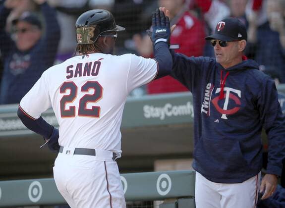 April 6, 2017 - Minneapolis, MN, USA - The Minnesota Twins Miguel Sano (22) is greeted by manager Paul Molitor after scoring a run during the seventh inning against the Kansas City Royals at Target Field in Minneapolis on Thursday, April 6, 2017. The Twins won, 5-3. Kansas City at Minnesota - ZUMAm67_ 20170406_zaf_m67_037 Copyright: xElizabethxFloresx