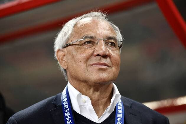 Head coach Felix Magath of Shandong Luneng reacts as he watches his players competing against Shanghai SIPG in their fourth round match during the 2017 Chinese Football Association Super League (CSL) in Shanghai, China, 7 April 2017. Shanghai SIPG competes against Shandong Luneng at fourth round match of 2017 CSL  20170407_49788