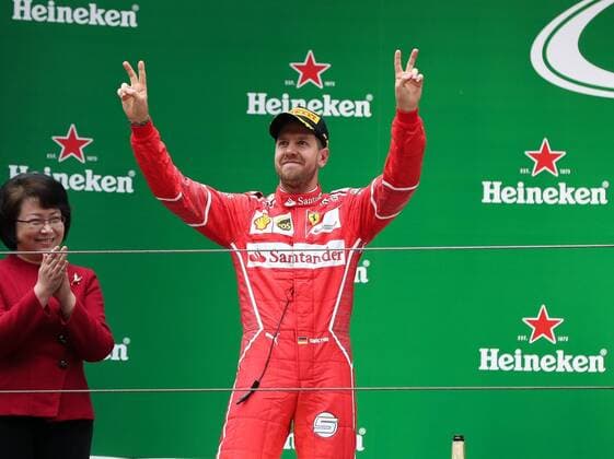German F1 Sebastian Vettel of Ferrari poses during the award presentation ceremony of the 2017 Formula One Chinese Grand Prix at the Shanghai International Circuit in Shanghai, China, 9 April 2017. Lewis Hamilton wins 2017 Formula 1 Chinese Grand Prix  pbu604643_14