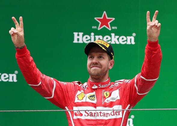 German F1 Sebastian Vettel of Ferrari poses during the award presentation ceremony of the 2017 Formula One Chinese Grand Prix at the Shanghai International Circuit in Shanghai, China, 9 April 2017. Lewis Hamilton wins 2017 Formula 1 Chinese Grand Prix  scr100807