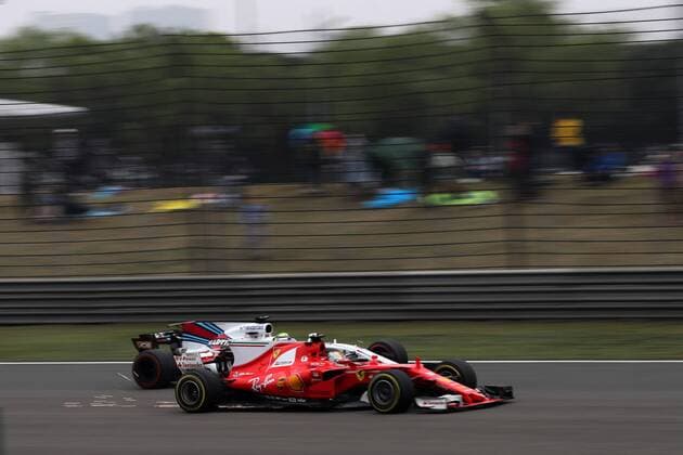 Chinese Grand Prix, Shanghai 06 - 09 April 2017 09.04.2017 - Race, Sebastian Vettel (GER) Scuderia Ferrari SF70H and Felipe Massa (BRA) Williams FW40 