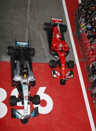 Shanghai: Motorsports: FIA Formula One World Championship WM Weltmeisterschaft 2017 44 Lewis Hamilton (GBR, Mercedes AMG Petronas) 5 Sebastian Vettel (GER, Scuderia Ferrari) in parc ferme Chinese Formula One Grand Prix Shanghai Circuit on April 08, 2017 in Shanghai, China. (Photo by Hoch Zwei) Shanghai China xHZx