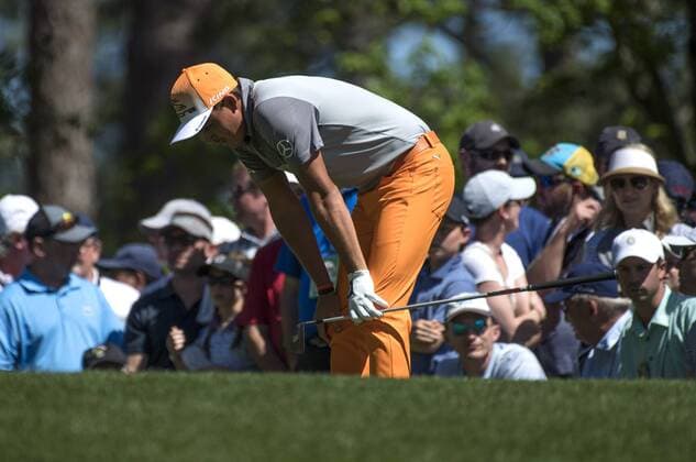 Ricky Fowler reacts after hitting off the fourth tee box during the fourth round of the 2017 Masters Tournament at Augusta National Golf Club in Augusta, Georgia on April 9, 2017.  AUG20170409303 KEVINxDIETSCH