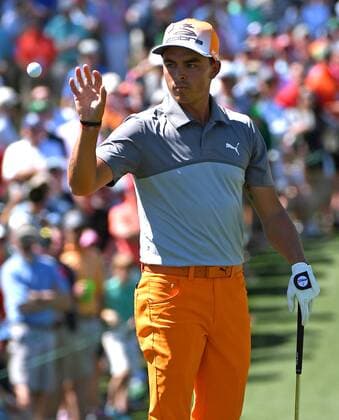 April 9, 2017 - Augusta, GA, USA - Rickie Fowler reaches out to grab his ball prior to putting on the second green during the final round of the Masters Tournament on Sunday, April 9, 2017 at Augusta National Golf Club in Augusta, Ga. 2017 Masters Round 4 - ZUMAm67_ 20170409_zaf_m67_027 Copyright: xJeffxSinerx