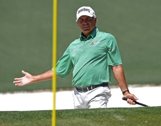 April 9, 2017 - Augusta, GA, USA - Fred Couples holds his arms out questioning why his ball did not go in the cup after hitting from a sand bunker along the second green during the final round of the Masters Tournament on Sunday, April 9, 2017 at Augusta National Golf Club in Augusta, Ga. 2017 Masters Round 4 - ZUMAm67_ 20170409_zaf_m67_048 Copyright: xJeffxSinerx