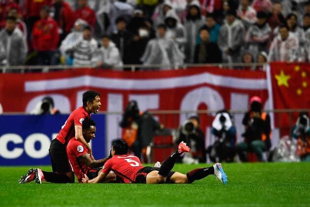 Rafael Silva, center, of Japan s Urawa Red Diamonds celebrates with his teammates after scoring a goal against China s Shanghai SIPG in their Group F match during the AFC Champions League 2017 in Saitama, Japan, 11 April 2017. Urawa Red Diamonds competes against Shanghai SIPG at AFC Champions League group match  20170411_48274