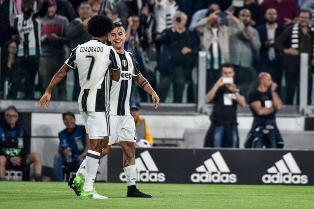 Paulo Dybala of Juventus and Juan Cuadrado of Juventus celebrates the goal during the UEFA Champions League quarter final match between Juventus and Barcelona at the Juventus Stadium, Turin, Italy on 11 April 2017. Copyright: xGiuseppexMaffiax 14920069