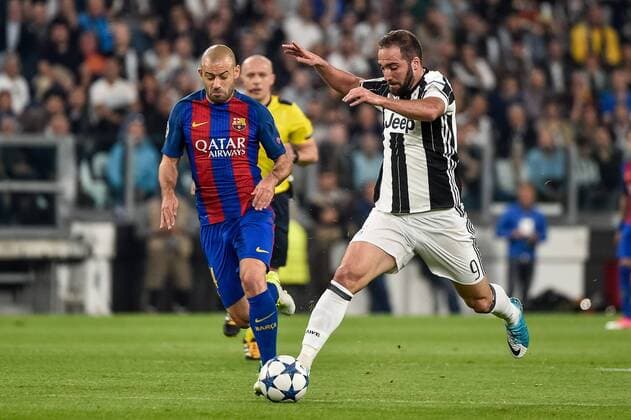Gonzalo Higuain of Juventus and Javier Mascherano of Barcelona during the UEFA Champions League quarter final match between Juventus and Barcelona at the Juventus Stadium, Turin, Italy on 11 April 2017. Copyright: xGiuseppexMaffiax 14920078