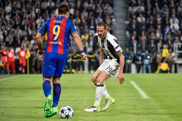 Luis Su‡rez of Barcelona and Leonardo Bonucci of Juventus during the UEFA Champions League quarter final match between Juventus and Barcelona at the Juventus Stadium, Turin, Italy on 11 April 2017. Copyright: xGiuseppexMaffiax 14920106