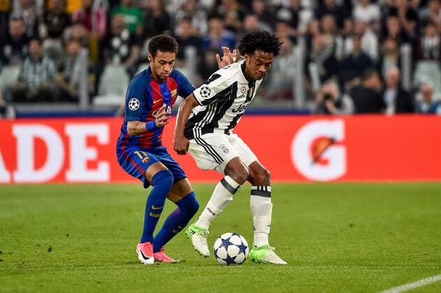 Neymar of Barcelona and Juan Cuadrado of Juventus during the UEFA Champions League quarter final match between Juventus and Barcelona at the Juventus Stadium, Turin, Italy on 11 April 2017. Copyright: xGiuseppexMaffiax 14920109