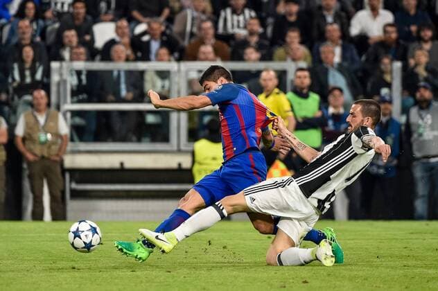Luis Su‡rez of Barcelona is challenged by Leonardo Bonucci of Juventus during the UEFA Champions League quarter final match between Juventus and Barcelona at the Juventus Stadium, Turin, Italy on 11 April 2017. Copyright: xGiuseppexMaffiax 14920111