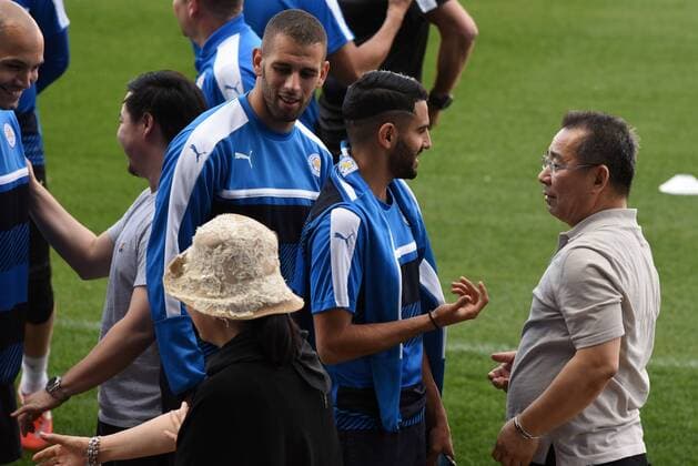 Spain: Leicester City training session Thai businessman Vichai Srivaddhanarabba (right) pictured with several players of Leicester City during a training session ahead of Champions League match with Atlético Madrid.  JorgexSanz PacificxPress