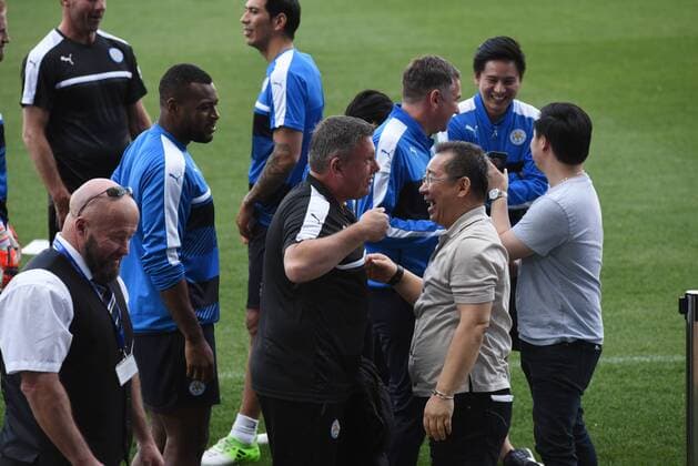Spain: Leicester City training session Thai businessman Vichai Srivaddhanarabba (right) pictured with several players of Leicester City during a training session ahead of Champions League match with Atlético Madrid.  JorgexSanz PacificxPress