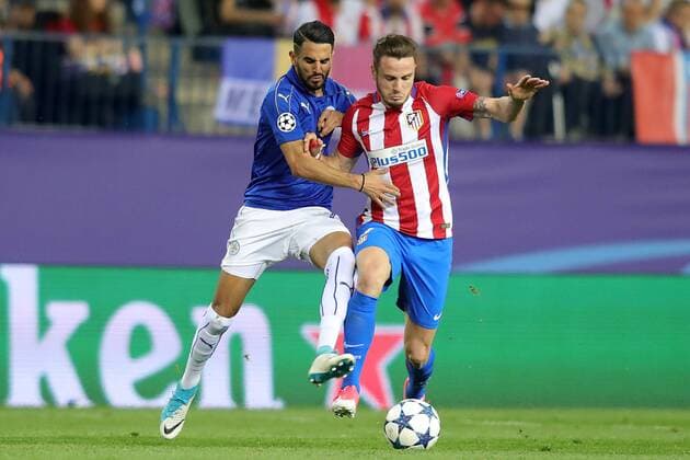 Atletico de Madrid s Saul Niguez (r) and Leicester City FC s Riyad Mahrez during Champions League 2016 2017 Quarter-finals 1st leg match. April 12,2017.  (2017041209)