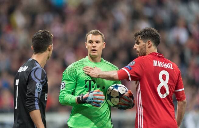 SOCCER - CL, Bayern vs Madrid MUNICH,GERMANY,12.APR.17 - SOCCER - UEFA Champions League, quarterfinal, FC Bayern Muenchen vs Real Madrid CF. Image shows Cristiano Ronaldo (Madrid), Manuel Neuer and Javi Martinez (Bayern). GEPAxpictures xMarkusxFischer