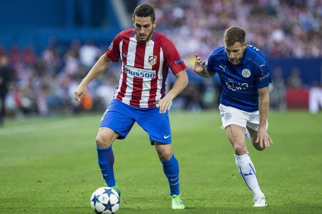 Koke Resurrecccion of Atletico de Madrid competes for the ball with Marc Albringhton of Leicester City Football Club during the match of Champions LEague between Atletico de Madrid and LEicester City Football Club at Vicente Calderon Stadium in Madrid, Spain. April 12, 2017.  (20170412049)