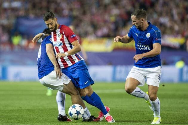 Shinji Okazaki of Leicester City Football Club competes for the ball with Yannick Ferreira Carrasco of Atletico de Madrid during the match of Champions LEague between Atletico de Madrid and LEicester City Football Club at Vicente Calderon Stadium in Madrid, Spain. April 12, 2017.  (20170412084)