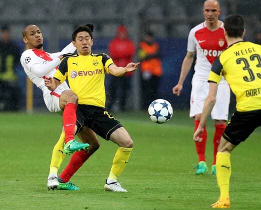 (170413) -- DORTMUND, April 13, 2017 -- Dortmund s Shinji Kagawa (2nd L) vies with Monaco s Fabinho (1st L) during their UEFA Champions League quarter-final first leg match in Dortmund, Germany, on April 12, 2017. Borussia Dortmund lost 2-3. ) (SP)GERMANY-DORTMUND-SOCCER-UEFA-DORTMUND VS MONACO JoachimxBywaletz 