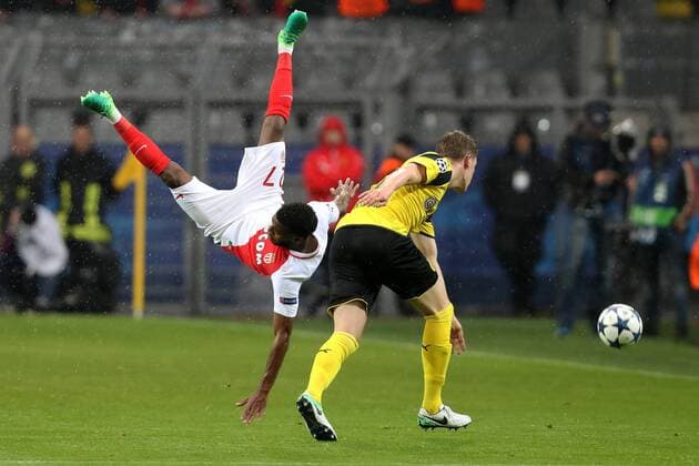 (170413) -- DORTMUND, April 13, 2017 -- Dortmund s Matthias Ginter (R) vies with Monaco s Thomas Lemar during their UEFA Champions League quarter-final first leg match in Dortmund, Germany, on April 12, 2017. Borussia Dortmund lost 2-3. ) (SP)GERMANY-DORTMUND-SOCCER-UEFA-DORTMUND VS MONACO JoachimxBywaletz 