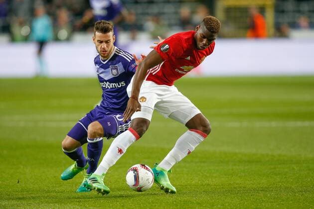 Anderlecht s Massimo Bruno and Manchester s Paul Pogba fight for the ball during a soccer game between Belgian team RSC Anderlecht and English club Manchester United ManU F.C. in Brussels, Thursday 13 April 2017, the first leg of the quarter finals of the Europa League competition. BRUNOxFAHY  x05081072x