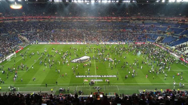 Supporters enter to the field before the starting of Europa League quarter-final with Lyon and Besiktas  15669978