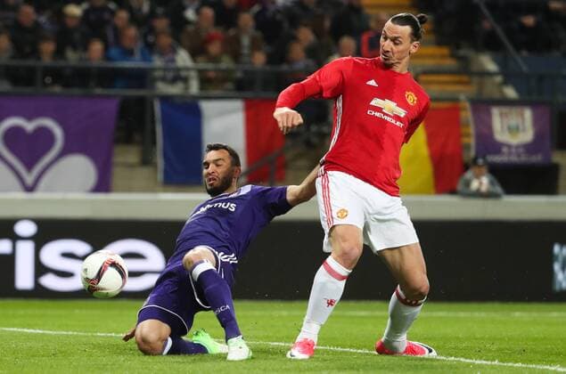 Anderlecht s Ivan Obradovic and Manchester s Zlatan Ibrahimovic fight for the ball during a soccer game between Belgian team RSC Anderlecht and English club Manchester United ManU F.C. in Brussels, Thursday 13 April 2017, the first leg of the quarter finals of the Europa League competition. VIRGINIExLEFOUR  x05081106x