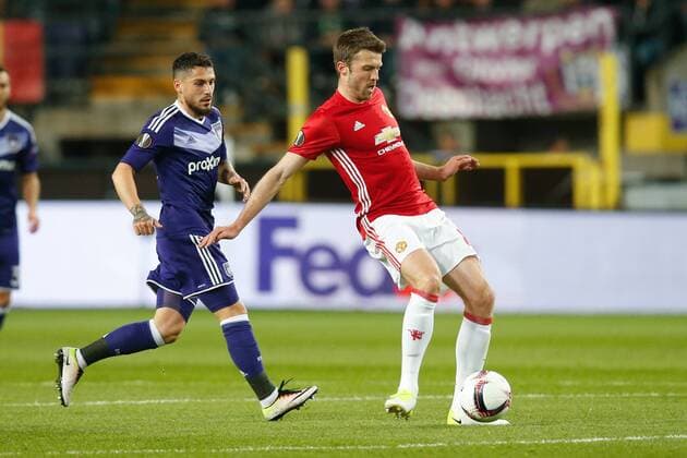 Anderlecht s Nicolae-Claudiu Stanciu and Manchester s Matteo Darmian fight for the ball during a soccer game between Belgian team RSC Anderlecht and English club Manchester United ManU F.C. in Brussels, Thursday 13 April 2017, the first leg of the quarter finals of the Europa League competition. BRUNOxFAHY  x05081110x