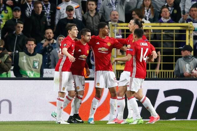 Manchester s Henrikh Mkhitaryan (2L) celebrates with teammates after scoring during a soccer game between Belgian team RSC Anderlecht and English club Manchester United ManU F.C. in Brussels, Thursday 13 April 2017, the first leg of the quarter finals of the Europa League competition. BRUNOxFAHY  x05081144x