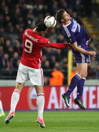 Manchester s Zlatan Ibrahimovic and Anderlecht s Leander Dendoncker fight for the ball during a soccer game between Belgian team RSC Anderlecht and English club Manchester United ManU F.C. in Brussels, Thursday 13 April 2017, the first leg of the quarter finals of the Europa League competition. VIRGINIExLEFOUR  x05081150x
