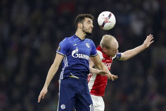 (L-R) Nabil Bentaleb of FC Schalke 04, Davy Klaassen of Ajaxduring the UEFA Europa League quarter final match between Ajax Amsterdam and FC Schalke 04 at the Amsterdam Arena on April 13, 2017 in Amsterdam, The Netherlands Ajax v FC Schalke 04 UEFA Europa League 2016 2017 xVIxxIVx 7562890